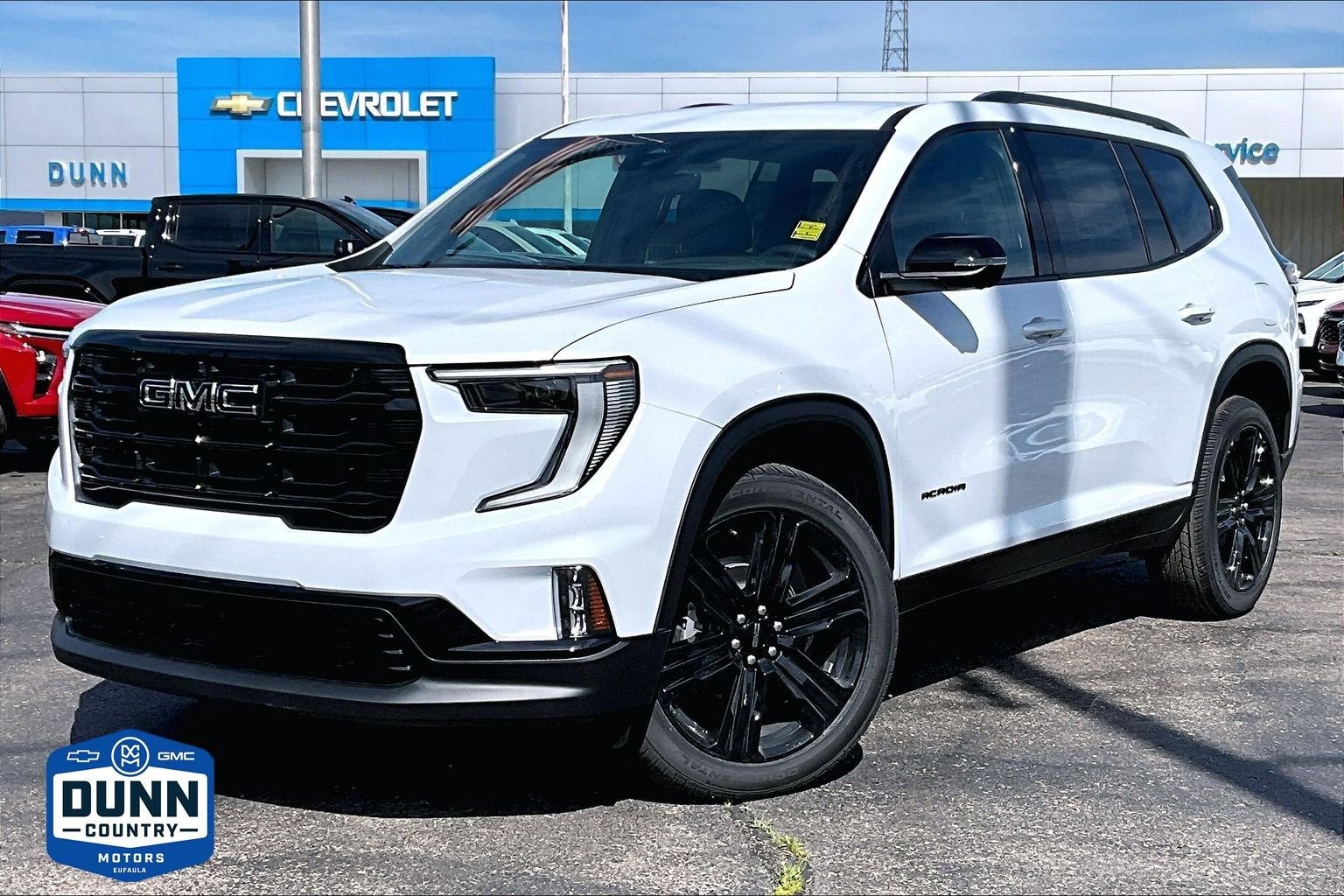 2026 GMC Acadia Elevation in Glacier White Tricoat — front three-quarter view
