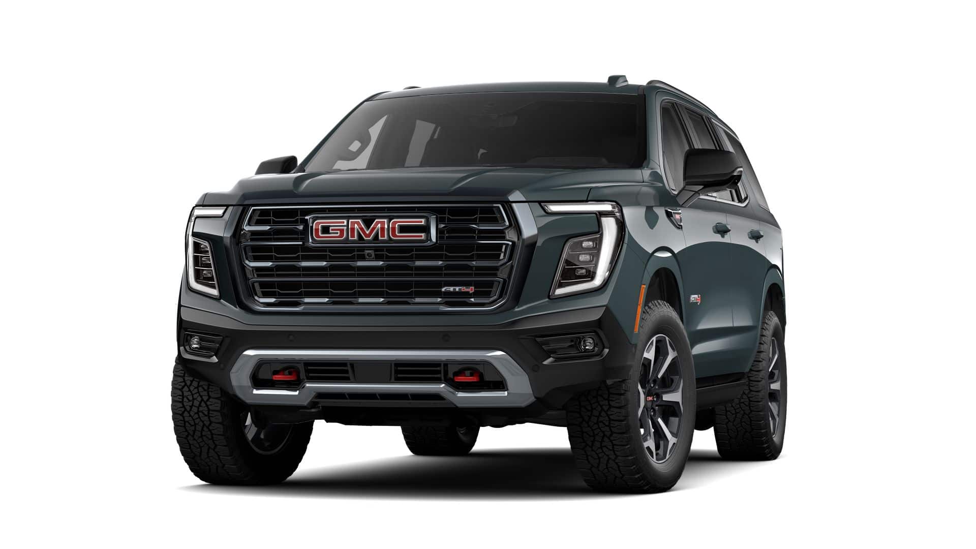 2026 GMC Yukon AT4 in Midnight Pine — front three-quarter view